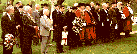 officials, ready to lay wreaths