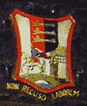 arms from the panel; non recuso laborem, I do not refuse work, Dover College mottoo