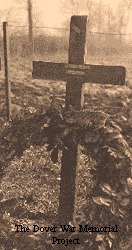 wooden cross by grave pictured by Imperial War Graves Commission