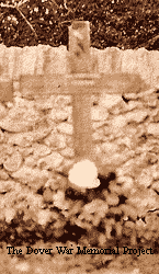 wooden cross by grave