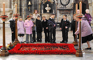 Rita Humphrey lays a poppy