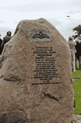 plane flying over stone