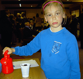 little girl with watering can