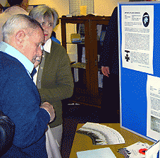 people looking at the exhibition