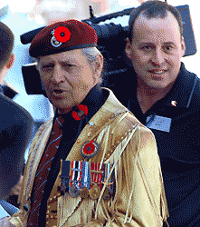 this man was himself a veteran, pictured with a cameraman