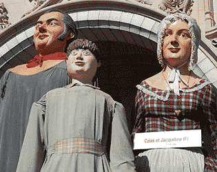 three figures some twelve feet tall, representing a man, woman, and boy