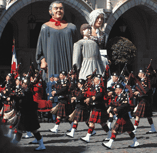 pipers marching past the giants