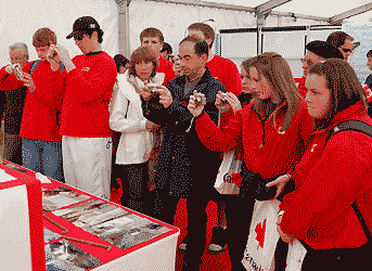 students photographing one of the stands