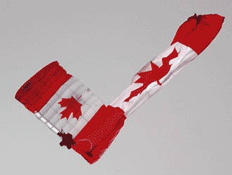 paraglider with a Maple Leaf chute and a large Maple Leaf flag