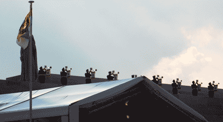 on the hill crest, Royal standard in foreground