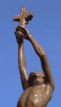 bronze figure in sunshine, by Simon Chambers