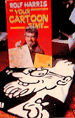 Rolf Harris shirt and book